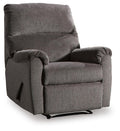 Ashley Nerviano manual recliner in brown leather, shown from an angle with closed reclining mechanism and cushioned armrests.