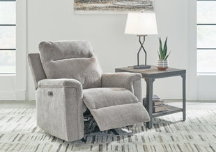 Open Barnsana Power Recliner by Ashley showing plush fabric, built-in recline mechanism, and modern design in a living room setting.