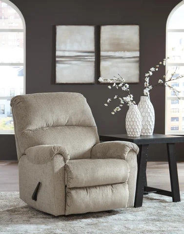 Ashley Stonemeade manual rocker recliner in closed position, featuring plush upholstery and comfortable design for relaxation.