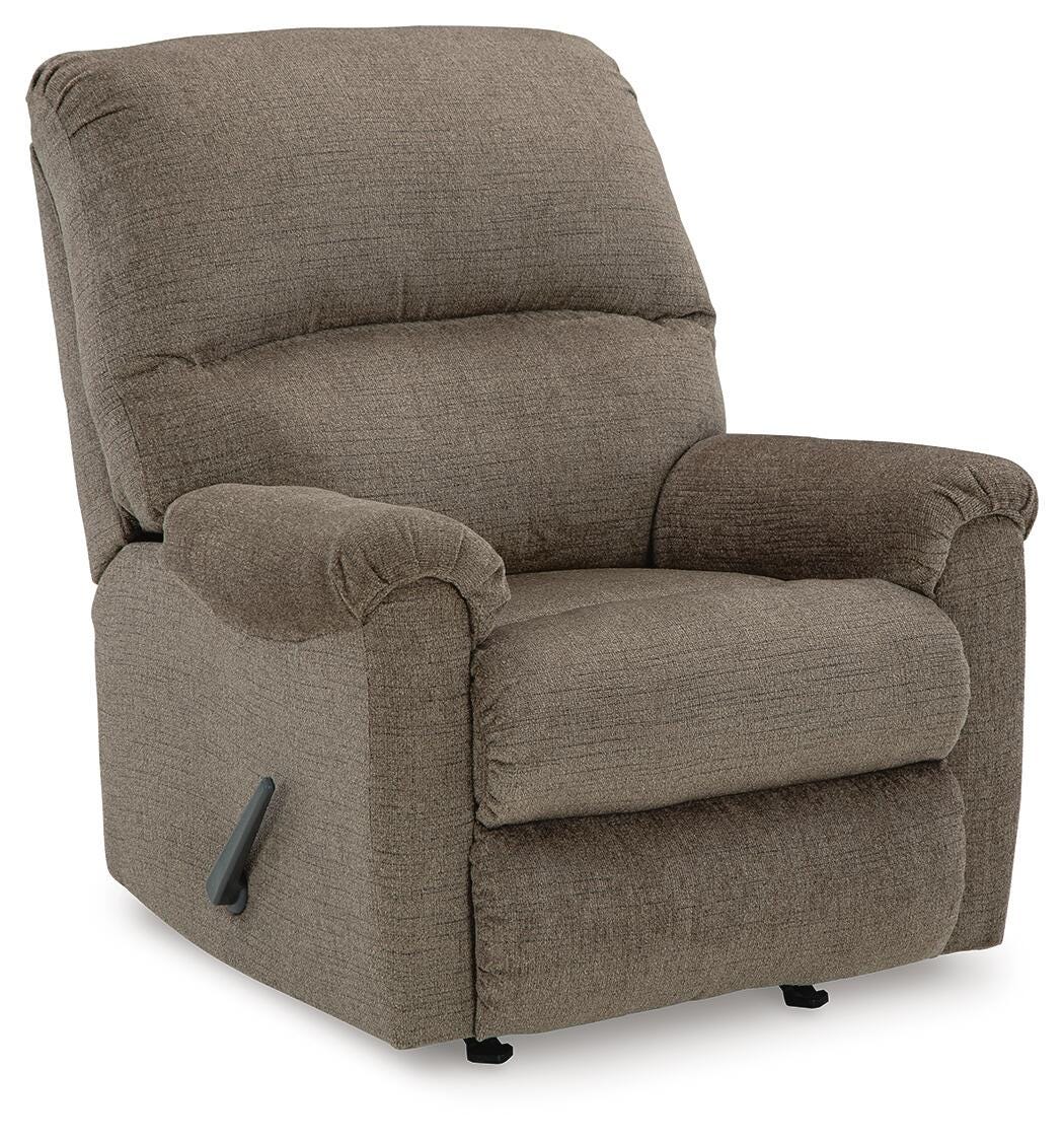 Ashley Stonemeade manual rocker recliner with plush fabric and padded armrests, shown from a side angle in a closed position.