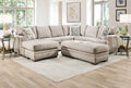 Cream U-shaped sectional sofa by Ashley with plush cushions and modern design, ideal for a spacious living room.