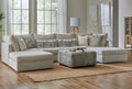 Behold modular cream sectional sofa with plush cushions and modern design, shown in a stylish living room setting.