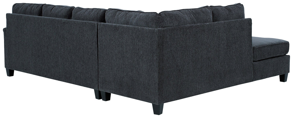 Slate grey Ashley L-shaped sectional sofa in a modern studio setting with plush cushions and sleek design.