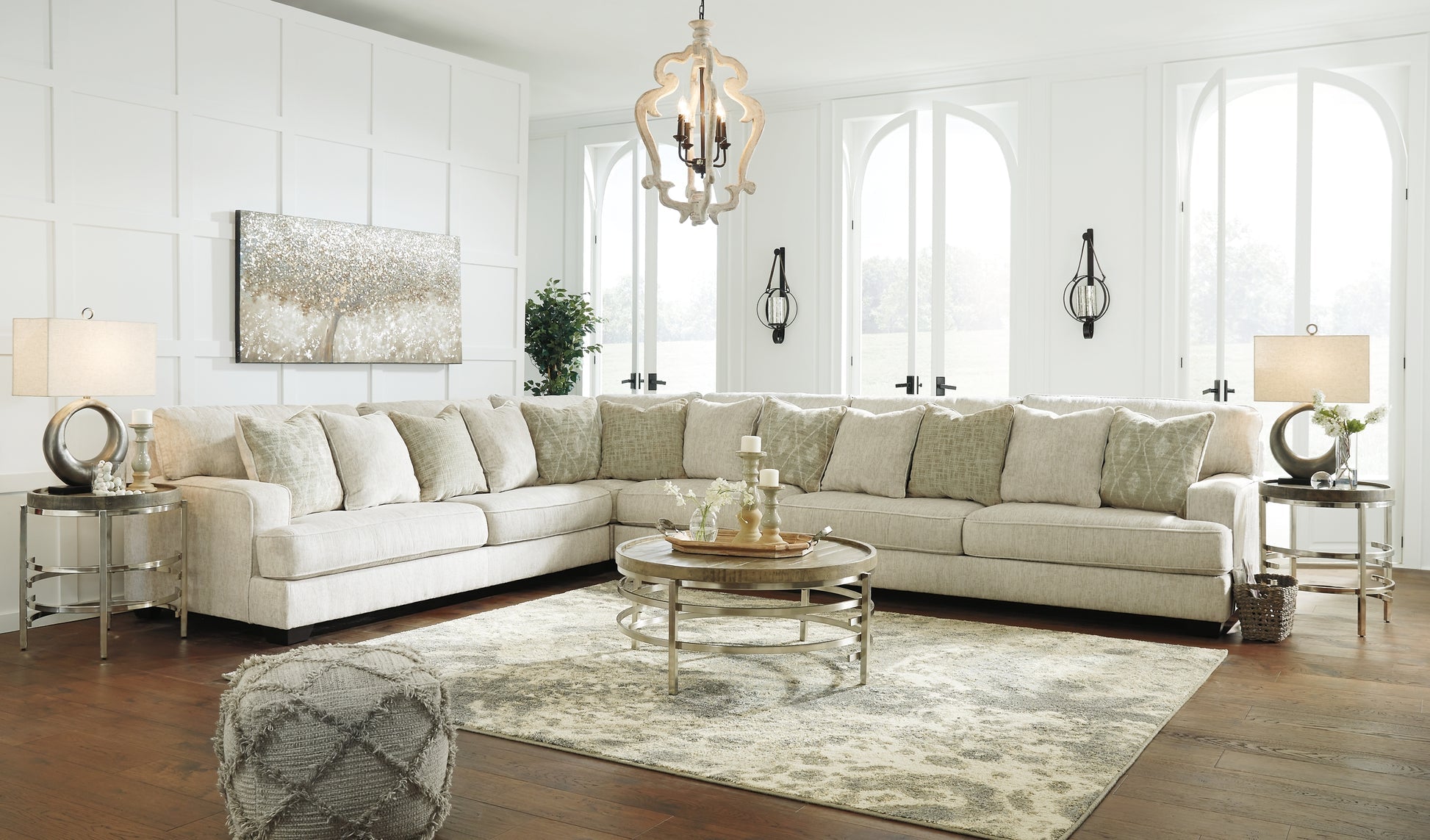 Ivory L-shaped sectional sofa by Ashley, showcasing plush cushions and modern design in a stylish living room setting.