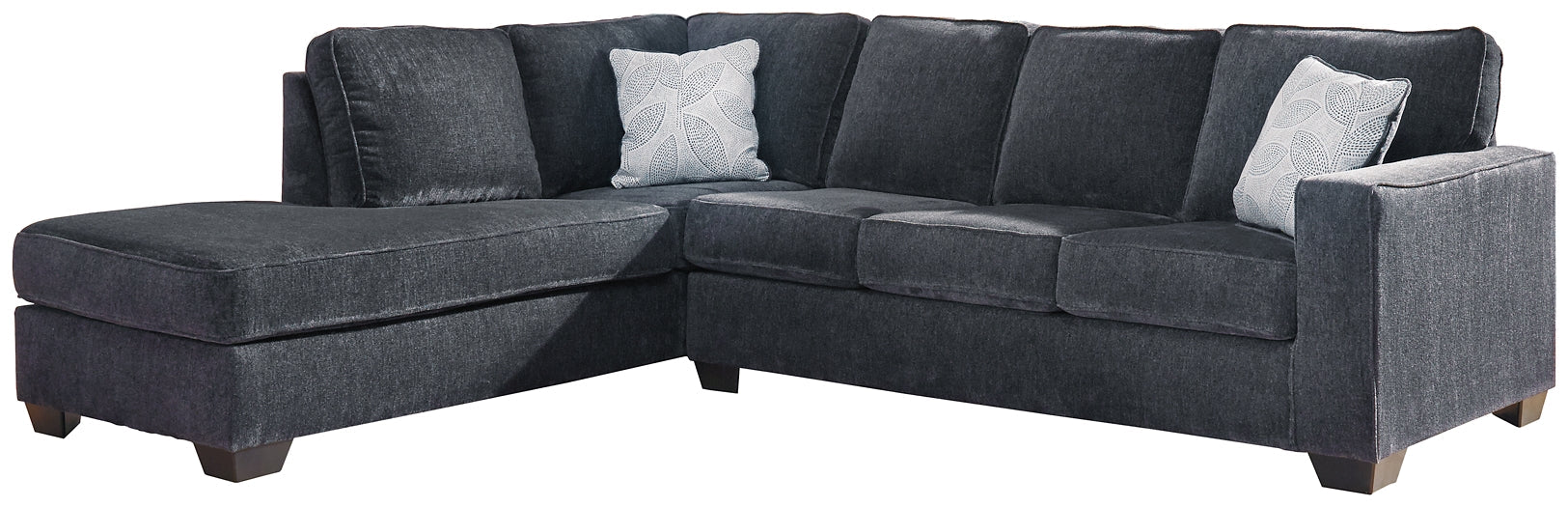 Slate grey Ashley L-shaped sectional sofa in a modern studio setting with plush cushions and sleek design.