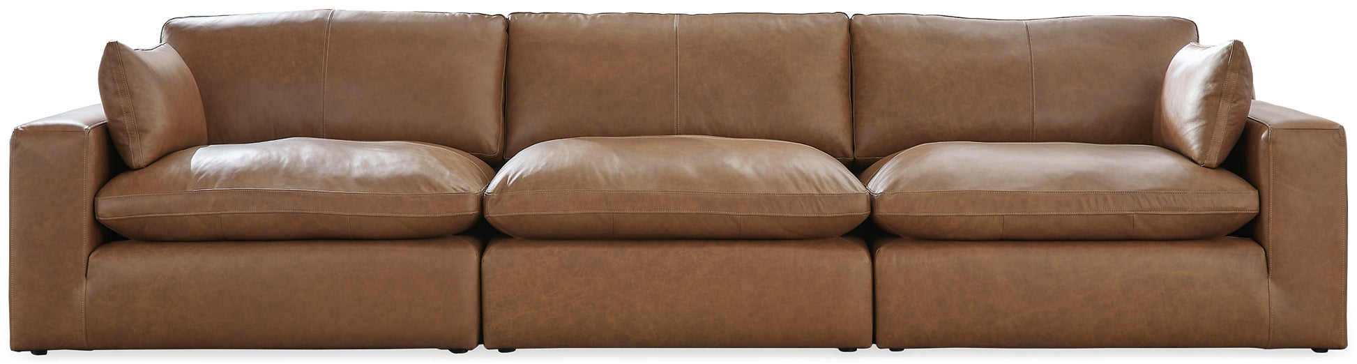 Genuine leather sectional sofa from Ashley with three pieces, featuring plush cushions and a modern design in a studio setting.