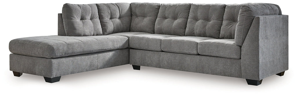 Grey Ashley L-shaped sectional sofa with plush cushions and modern design, shown in a stylish living room setting.