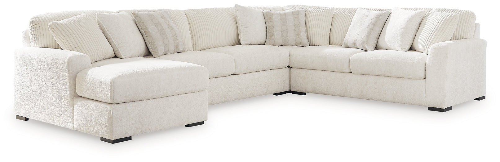 Ivory U-shaped sectional sofa by Ashley in a modern living room setting with plush cushions and sleek design.