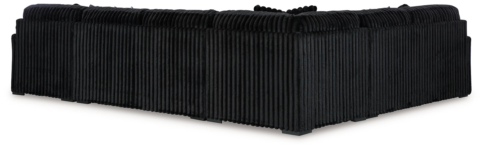 Black corduroy U-shaped sectional sofa by Ashley, featuring plush cushions and modern design in a stylish living room setting.