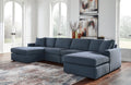 Blue Ashley modular U-shaped sectional sofa with plush cushions and modern design, shown in a stylish living room setting.