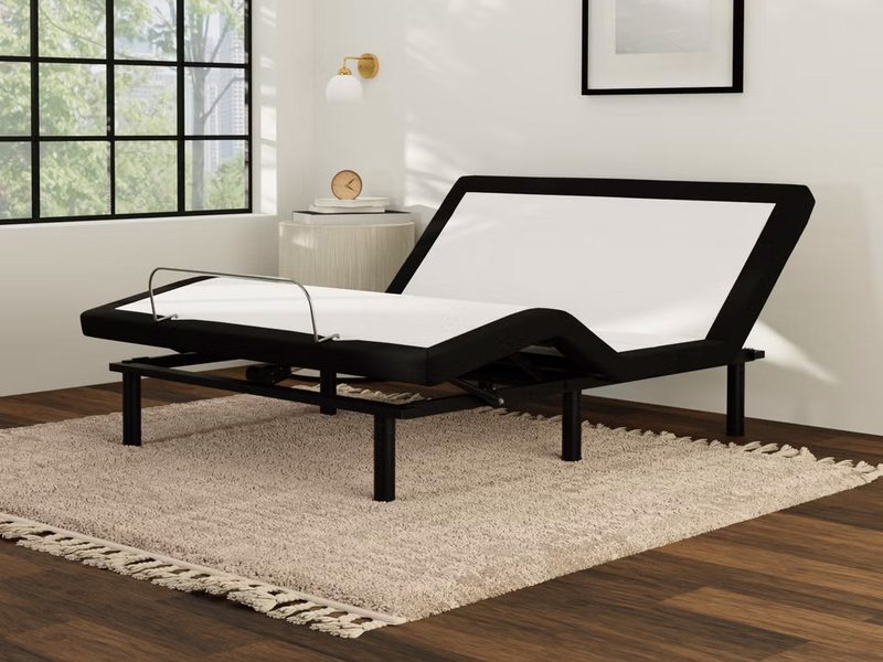 Adjustable bed base with head and foot lift